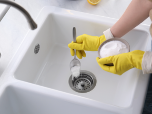 natural ways to unclog drains homeowner using baking soda